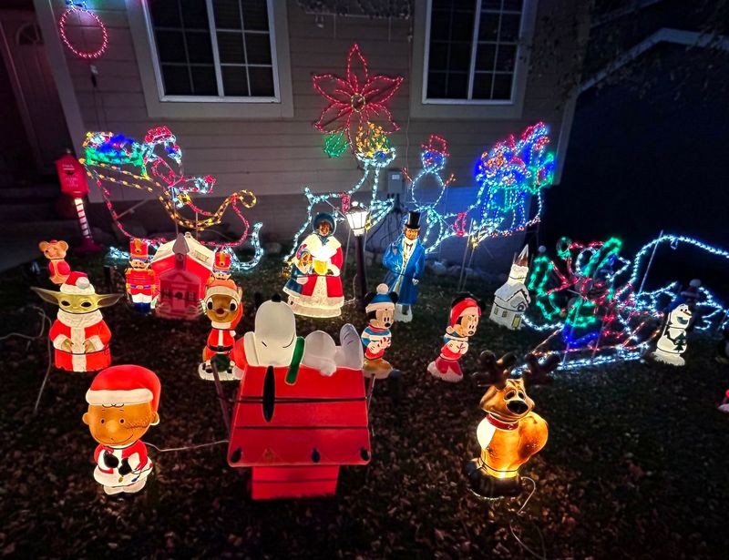 Blow molds gathered around a doghouse and sleigh